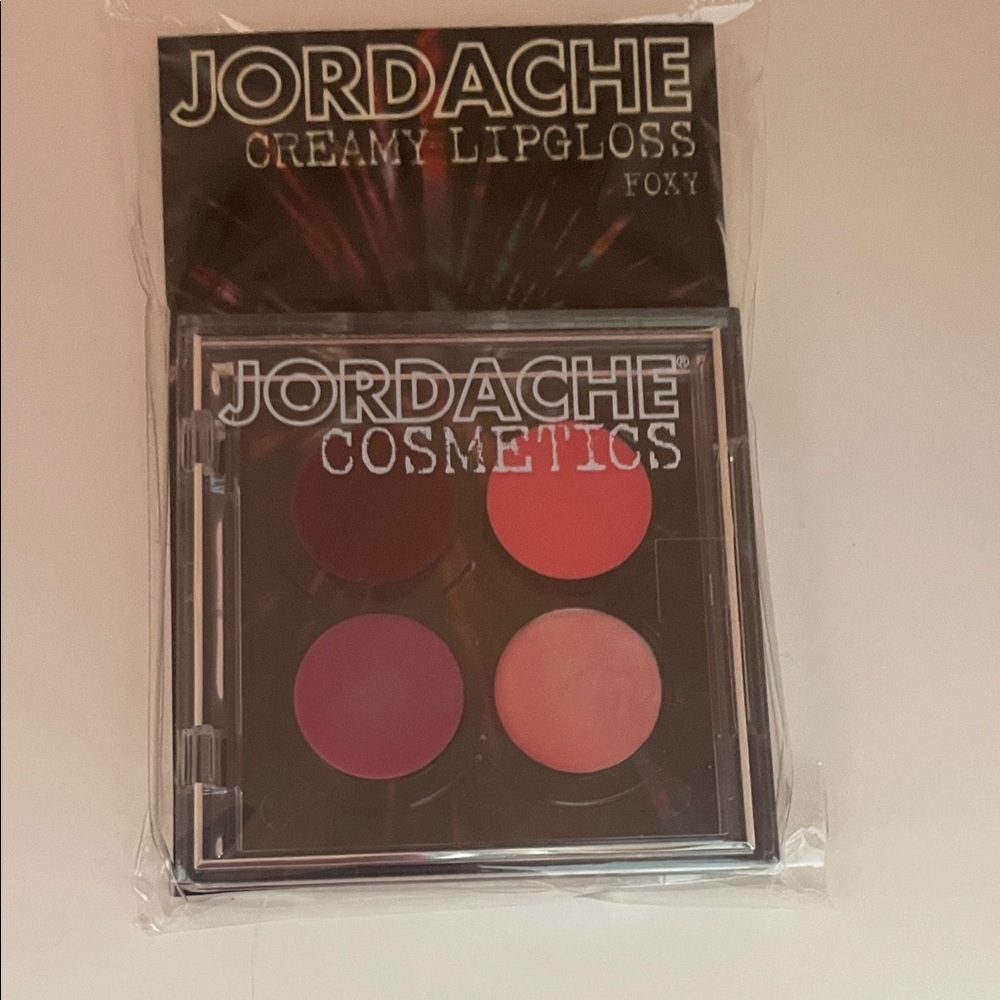 Jordache Creamy Lip Gloss Quad - Red and Pink Hues